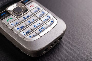 The keyboard of an old mobile phone. Buttons for dialing a telephone number.