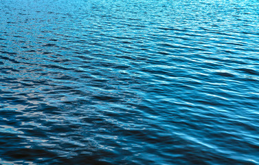 Blue water surface background, texture or pattern