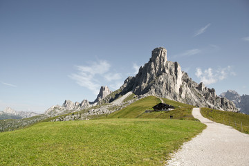 Hike the mountains of Passo Giau. The world famous Dolomites peaks in South Tyrol in the Alps of Italy. Belluno in Europe mountain scenery. Trekking path