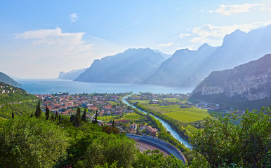 Panorama of the gorgeous Lake Garda surrounded by mountains in Riva del Garda, Italy.