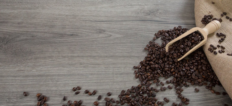 Roasted Coffee Beans Ion A Wooden Background