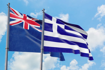Greece and Anguilla flags waving in the wind against white cloudy blue sky together. Diplomacy concept, international relations.