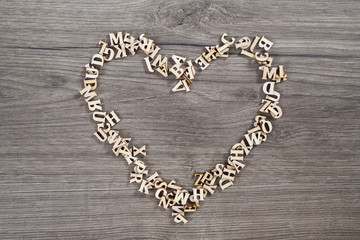 All alphabet letters creating a heart; valentines day preparation