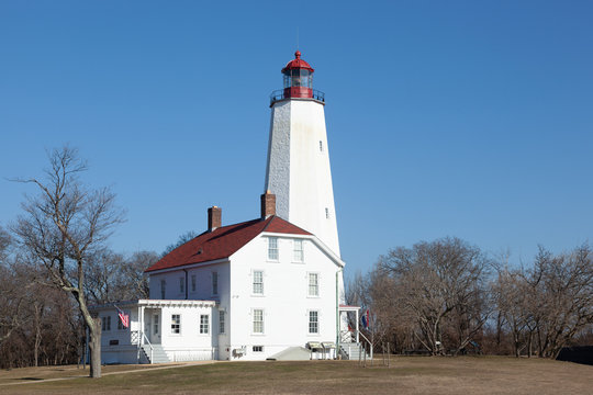 A view of the newly refreshed and painted Sandy Hook Lighthouse at Fort Hancock in Sandy Hook, New Jersey. Photo taken during January, 2020.
