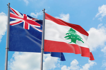 Lebanon and Anguilla flags waving in the wind against white cloudy blue sky together. Diplomacy concept, international relations.