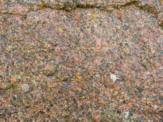 Close up texture of a light brown stone. Abstract nature background.