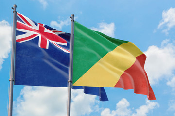 Republic Of The Congo and Anguilla flags waving in the wind against white cloudy blue sky together. Diplomacy concept, international relations.