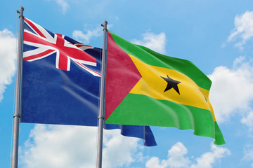 Sao Tome And Principe and Anguilla flags waving in the wind against white cloudy blue sky together. Diplomacy concept, international relations.