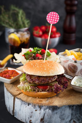 burger with fries and salad