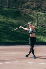 Female javelin thrower training