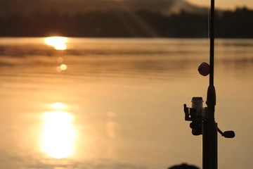 fishing at sunset