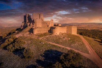 Aerial view of medieval castle ruin Pueble de Almenara in Cuenca Spain with convenctric walls,...