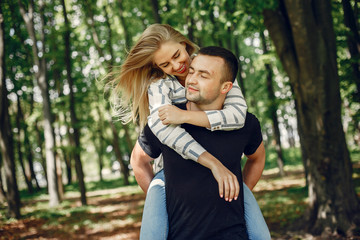 Couple in a forest, warm summer, lovely weather