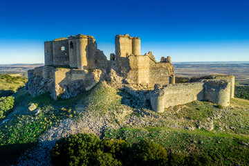 Aerial view of medieval castle ruin Pueble de Almenara in Cuenca Spain with convenctric walls,...