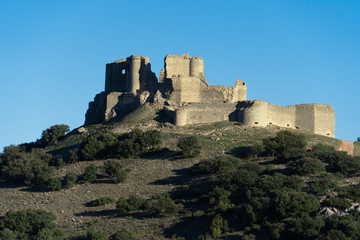 Obraz premium Aerial view of medieval castle ruin Pueble de Almenara in Cuenca Spain with convenctric walls, semicircular towers and angle bastions