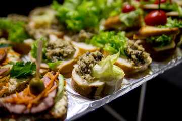 buffet sandwich with cheese and tomatoes