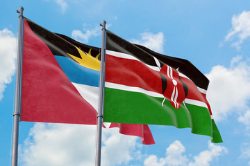 Fototapeta na wymiar Kenya and Antigua and Barbuda flags waving in the wind against white cloudy blue sky together. Diplomacy concept, international relations.