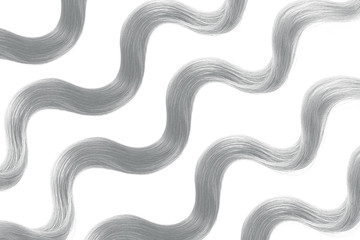 Gray hair on white, isolated. Thin curly threads as background