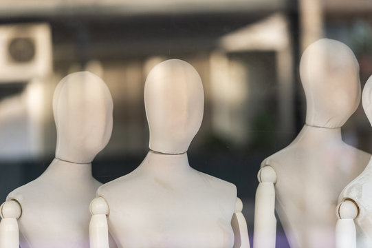 Boutique display window with mannequins