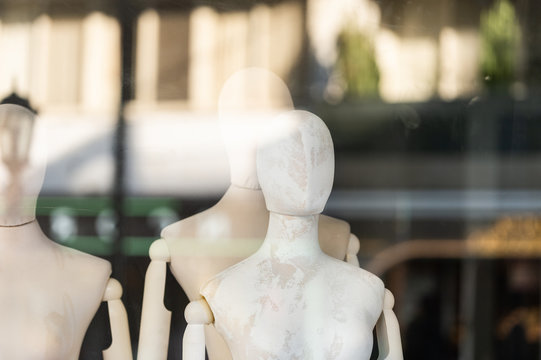 Boutique display window with mannequins