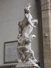 View of the Rape of the Sabine Women statue located in the Loggia dei Lanzi, on the Piazza della Signoria in Florence, Italy