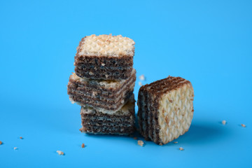 chocolate wafer blocks on a blue background