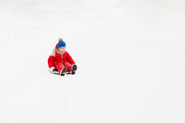 Winter fun: sliding on snow.