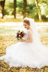 Fototapeta na wymiar Bride holding big and beautiful wedding bouquet with flowers