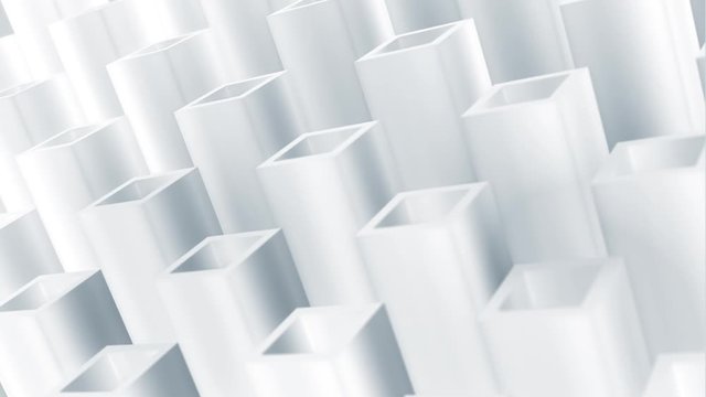 Abstract geometric background with white revolving cubes.