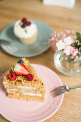 Delicious piece of cake on a plate in a cafe