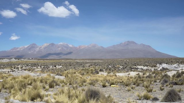 Panoramic view of rough dry landscape scenery in the highlands of the Andeas Mountains in Peru between Arequipa, Chivay and the Colca Canyon