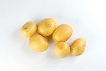 Yellow color small baby potato on white background