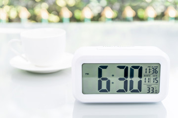 Digital clock on table at home