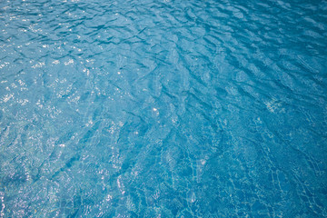 Blue water surface in the swimming pool