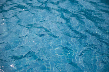 Blue water surface in the swimming pool