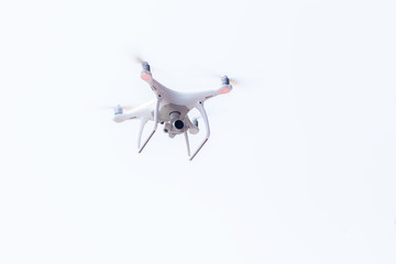 Air Drone Dron Flying with action camera. Isolated on White Background.