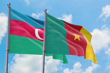 Cameroon and Azerbaijan flags waving in the wind against white cloudy blue sky together. Diplomacy concept, international relations.