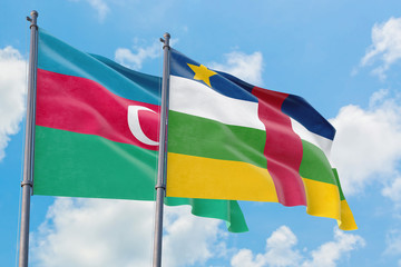 Central African Republic and Azerbaijan flags waving in the wind against white cloudy blue sky together. Diplomacy concept, international relations.