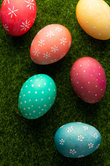 easter eggs on grass, easter composition. Easter background, vertical frame