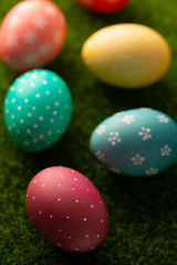 easter eggs on grass, easter composition. Easter background, vertical frame