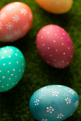 easter eggs on grass, easter composition. Easter background, vertical frame
