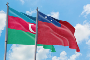 Samoa and Azerbaijan flags waving in the wind against white cloudy blue sky together. Diplomacy...