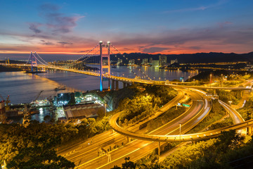 Tsing Ma Bridge in Hong Kong city at dusk