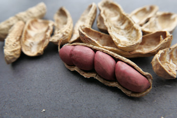 Close up of many peanuts on table