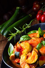 zucchini vegetarian ratatouille with tomato sauce and herbs