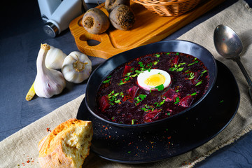 Delicious beetroot borscht with egg