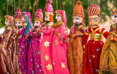 Focused and Defocused version of Handicraft Rajasthani Puppets toys displayed for sale in Jodhpur