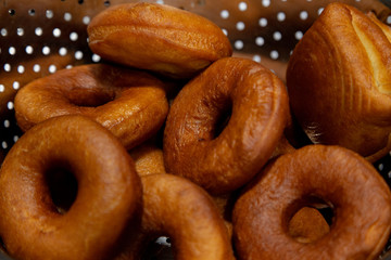 Focused and defocused Donuts. Fresh, golden brown and homely cooked Donuts
