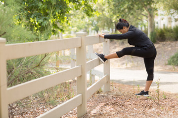 Fototapeta premium Portrait of a fit Asian woman exercising.