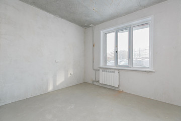 interior of the apartment without decoration in gray colors